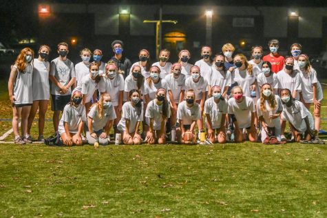  The Freshmen 2020 powderpuff team poses for a picture. All team members were required to wear masks. 