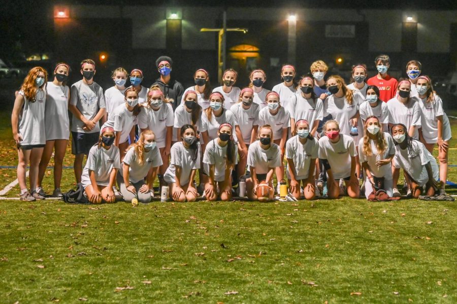 +The+Freshmen+2020+powderpuff+team+poses+for+a+picture.+All+team+members+were+required+to+wear+masks.+