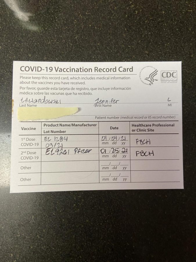 Jennifer Lewandowskis vaccination card. Since she works in a hospital, she has already gotten both her vaccines. 