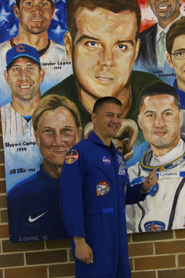 Photo by Devon Rudolph. Lindgren posing with his mural at Robinson Secondary. “I’m so grateful for Robinson,” Lindgren stated. “It gave me a foundation - a launchpad - for my dreams and trajectory that has come full circle so that I’m able to share with you all today.”