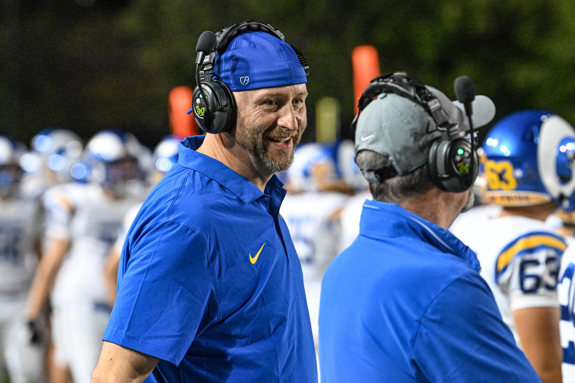 Coach Blair on the sidelines during the 27-6 win against South Lakes.