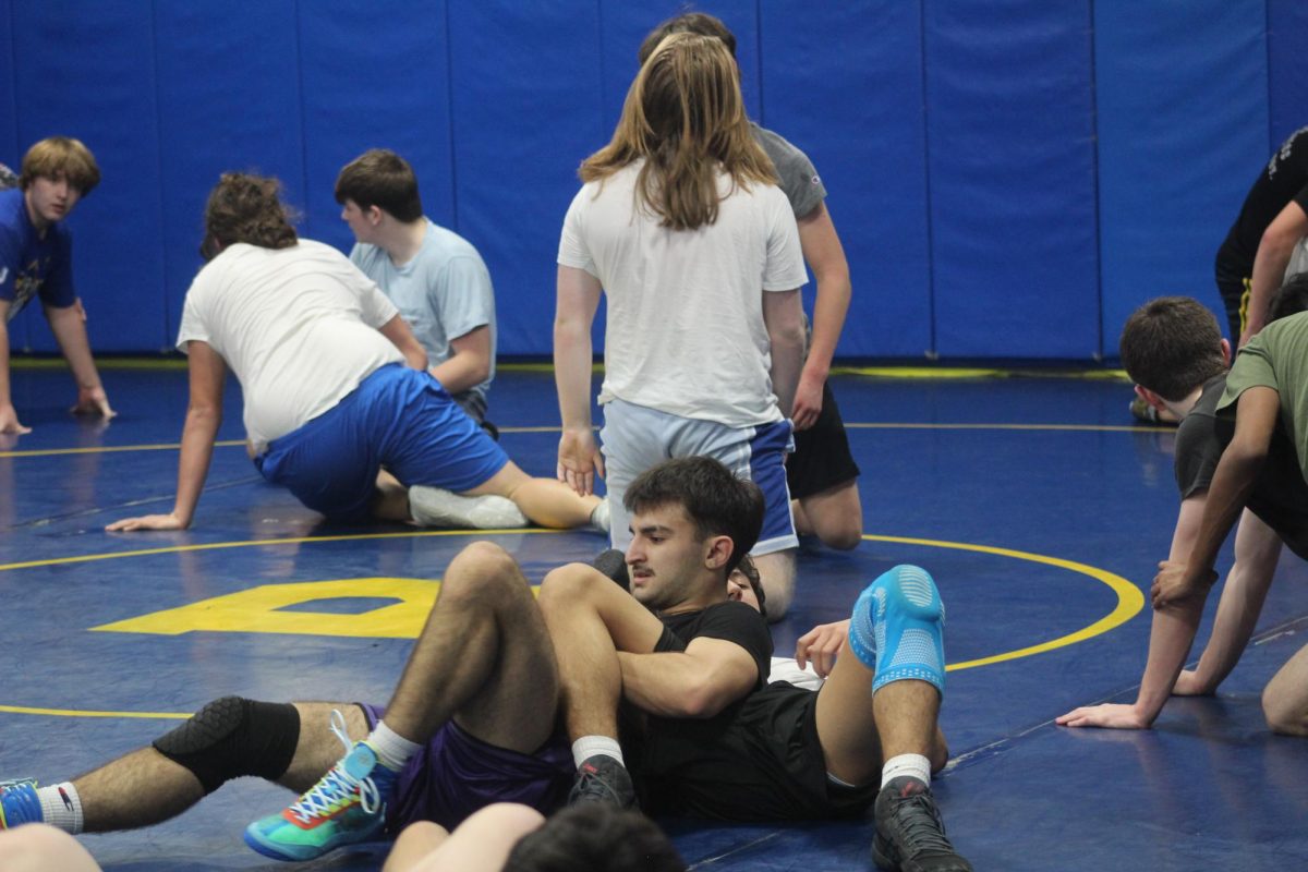 Members of the JV Wrestling Team practice on December 16th. The Wrestling Team is looking to improve their season. 